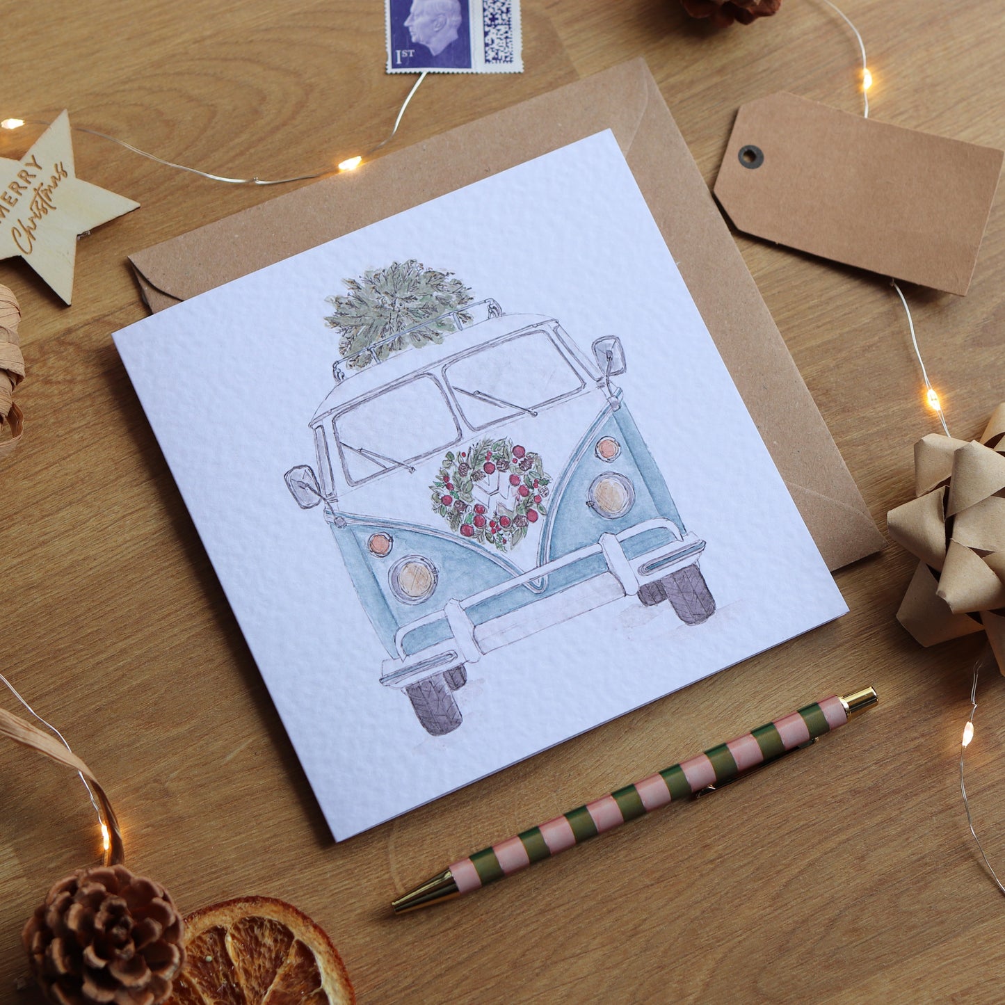 Christmas card with illustration of festive camper van