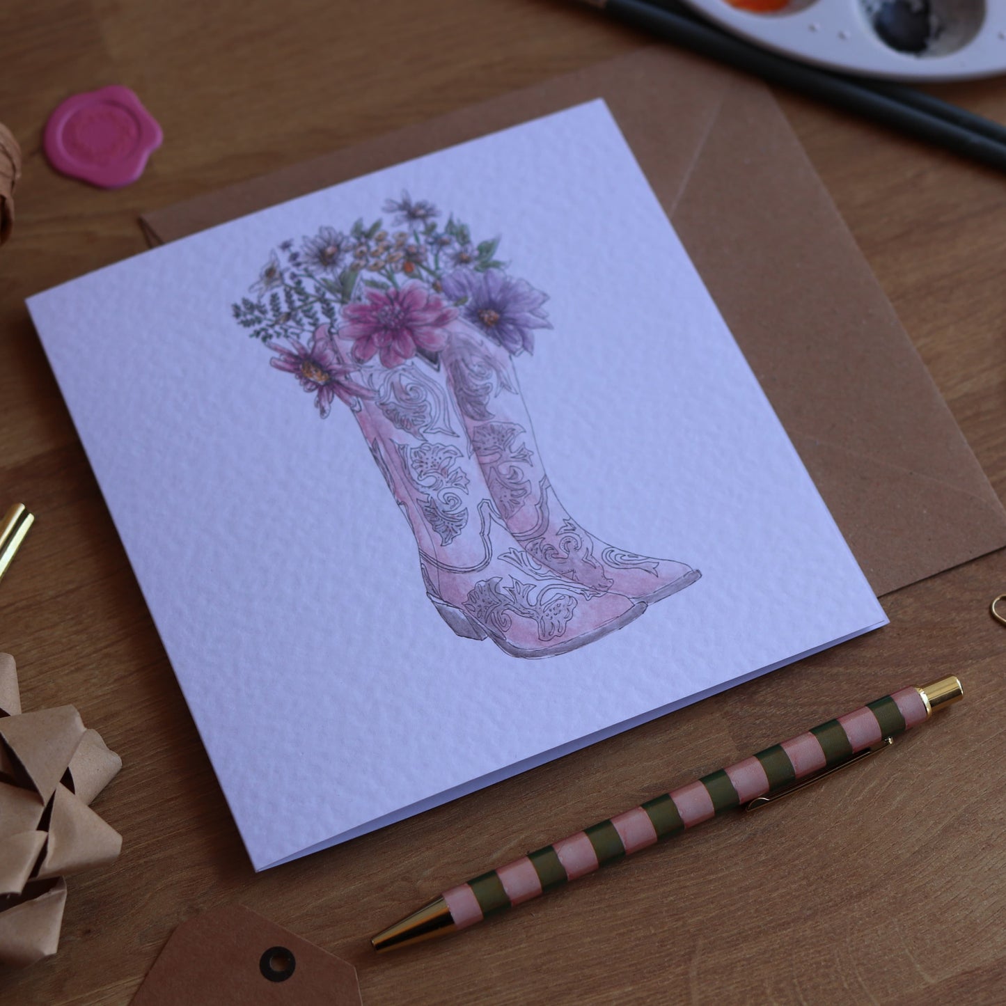 Greeting card with flower cowboy boots