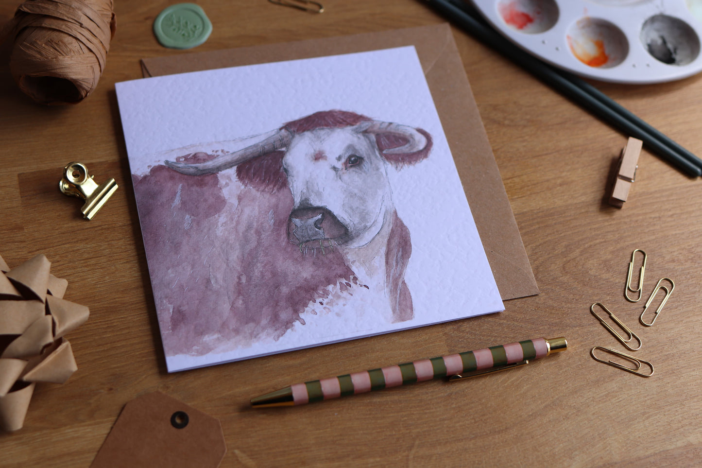 Card with illustration of longhorn cow
