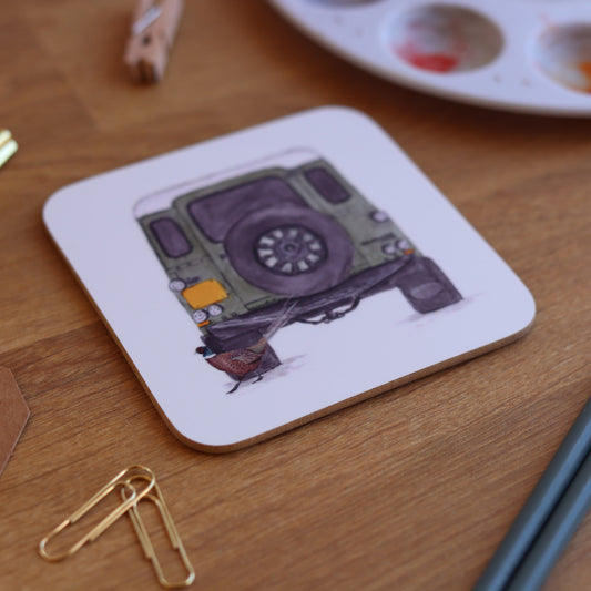 Land rover in green coaster with pheasant