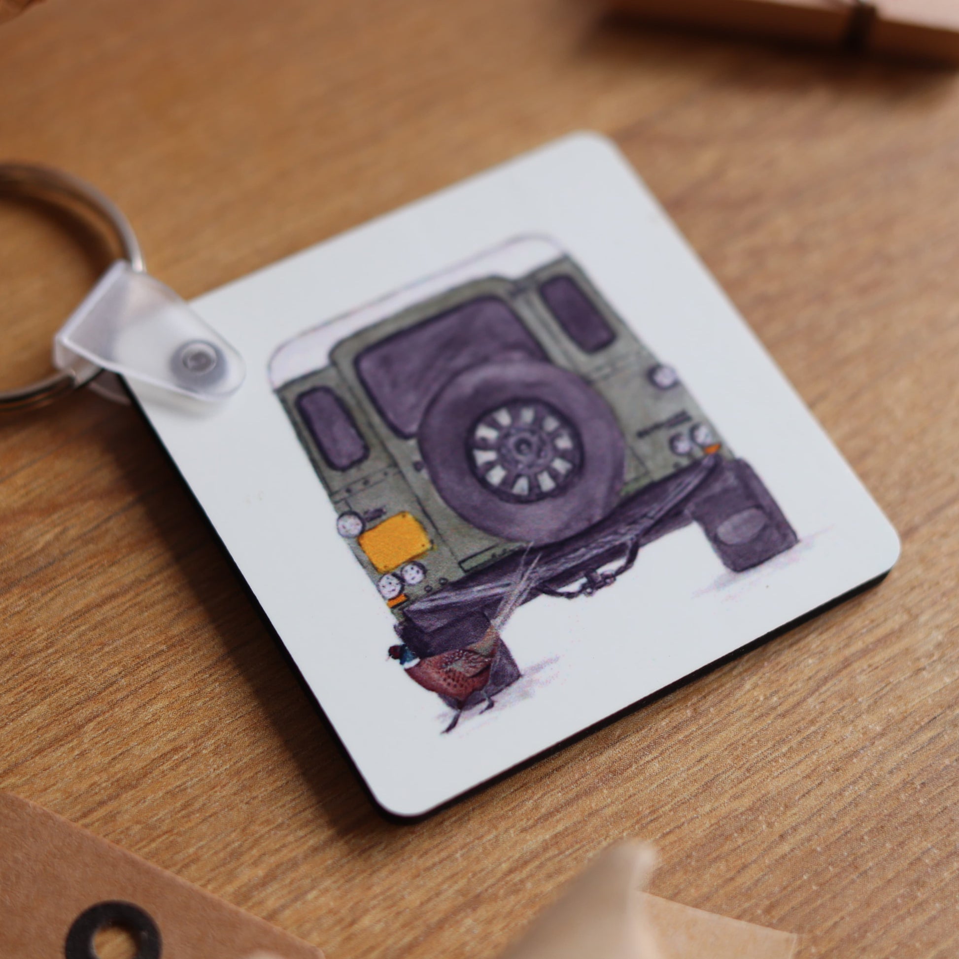 Green defender keyring with pheasant