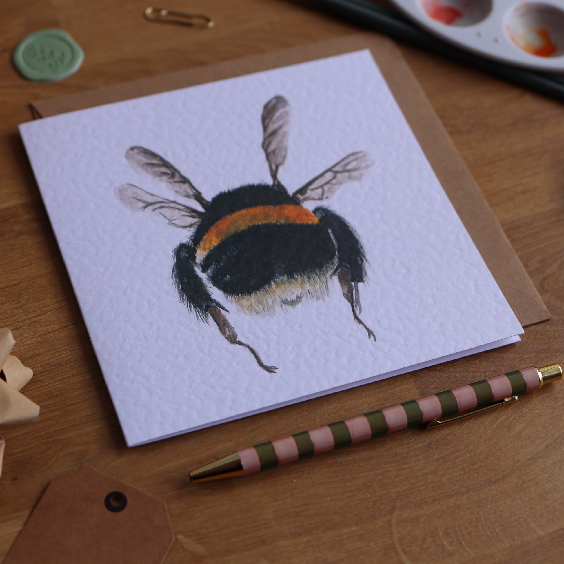 Greeting card of bumble bee flying