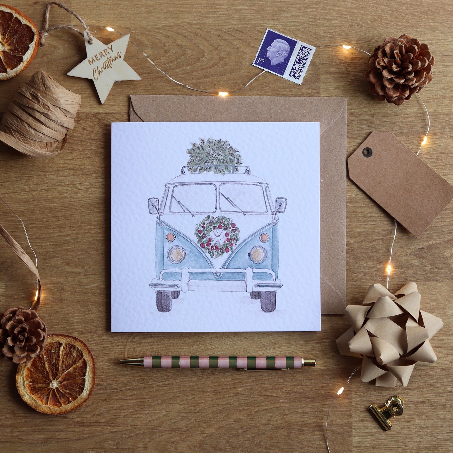 Christmas card with illustration of a festive camper van