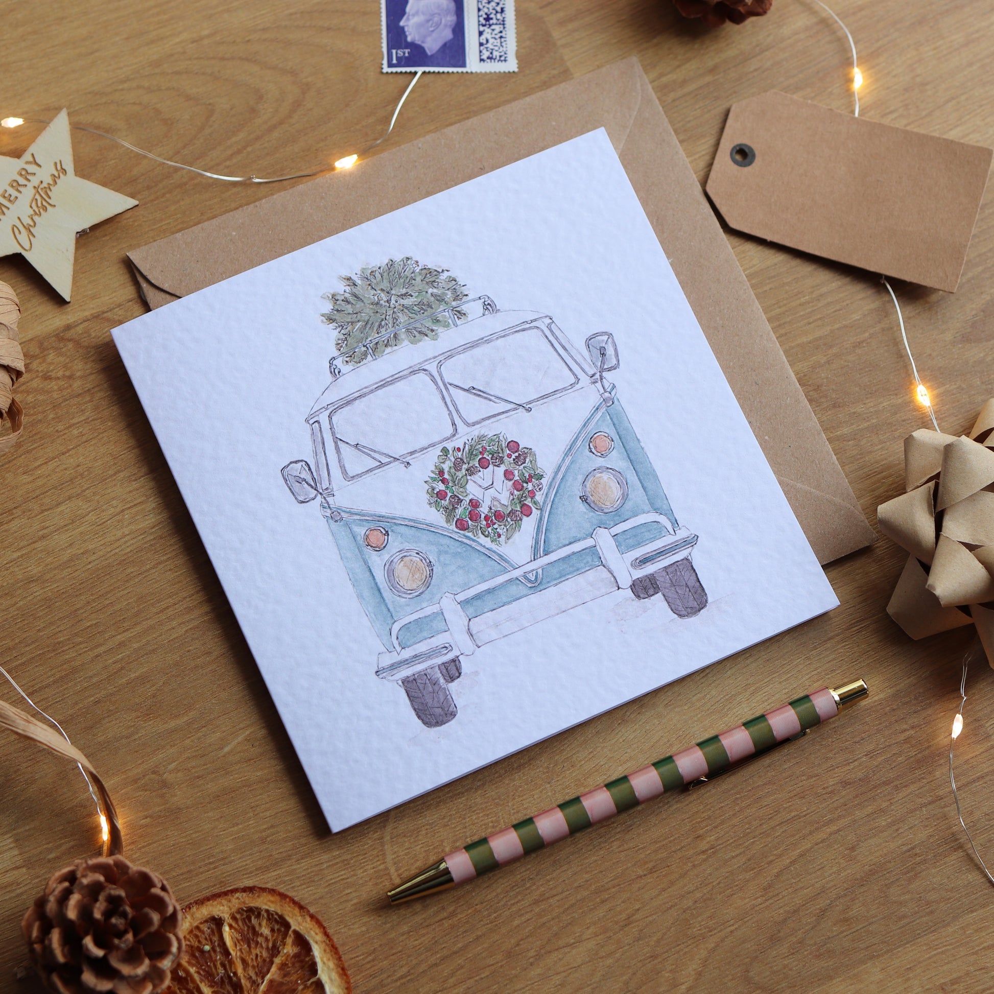 Christmas card with illustration of festive camper van