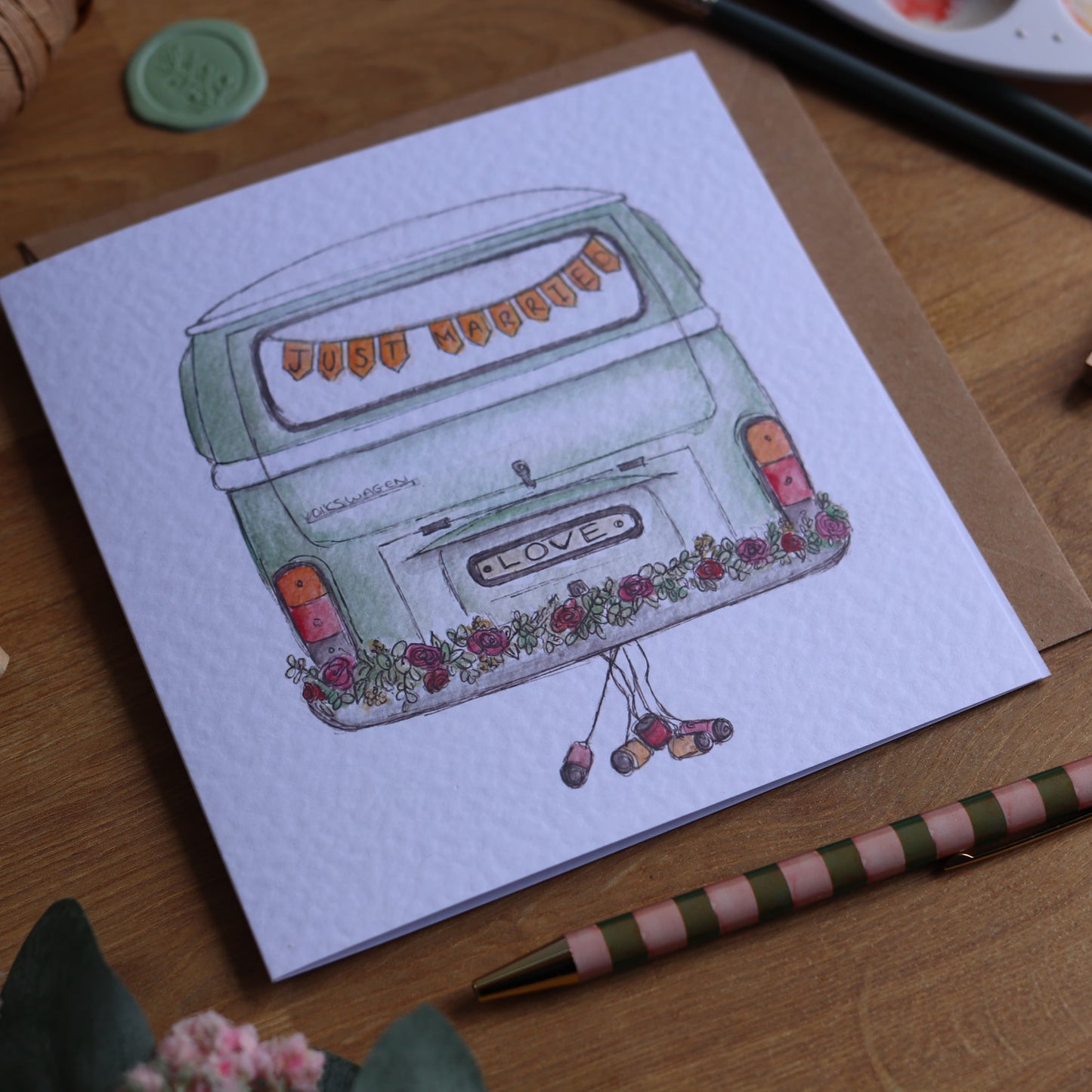 Greeting card with illustration of wedding camper van