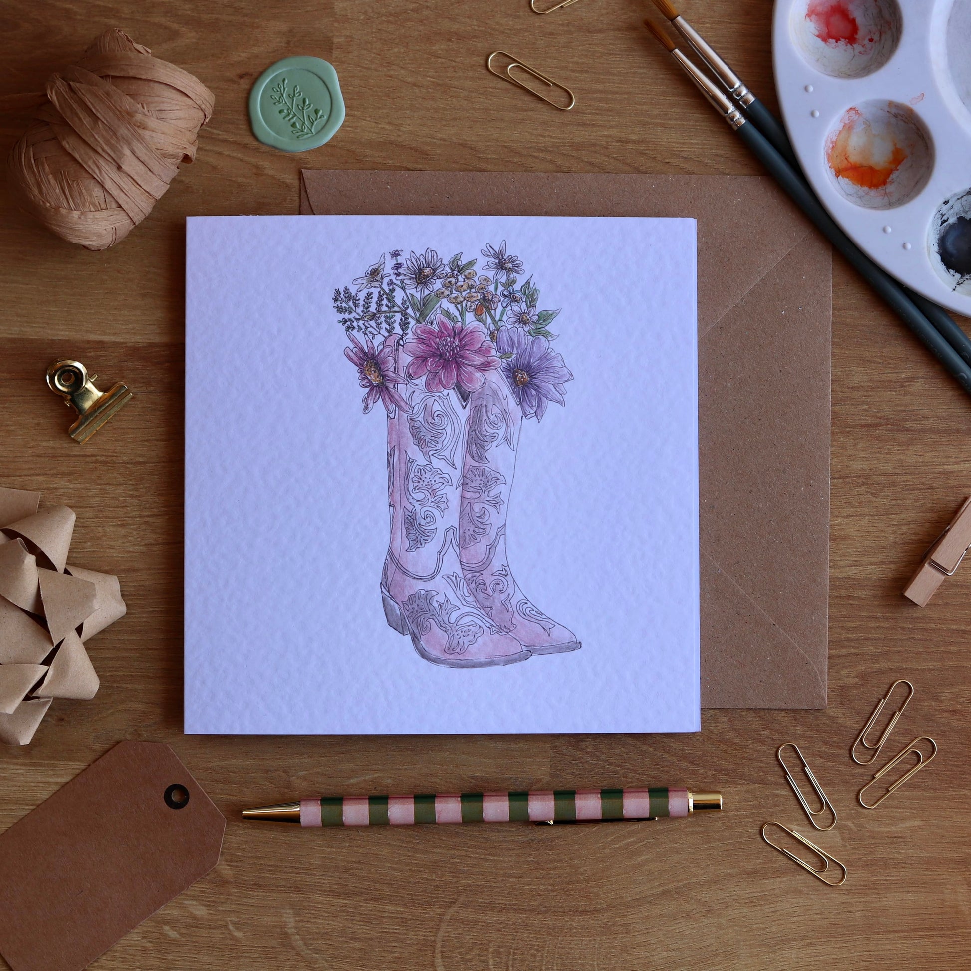 Greeting card with illustration of cowboy boots