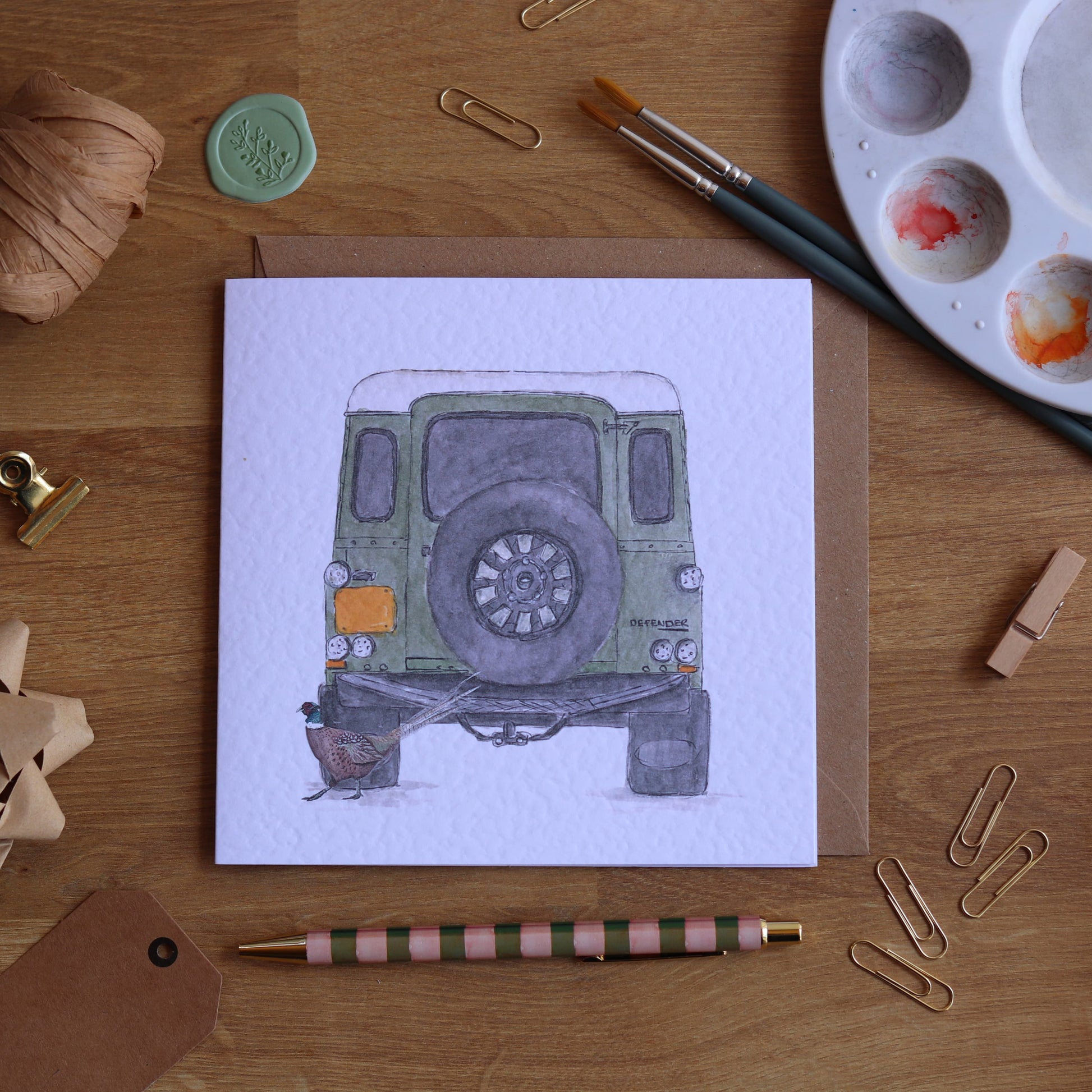 Greeting card with illustration of green country defender and pheasant