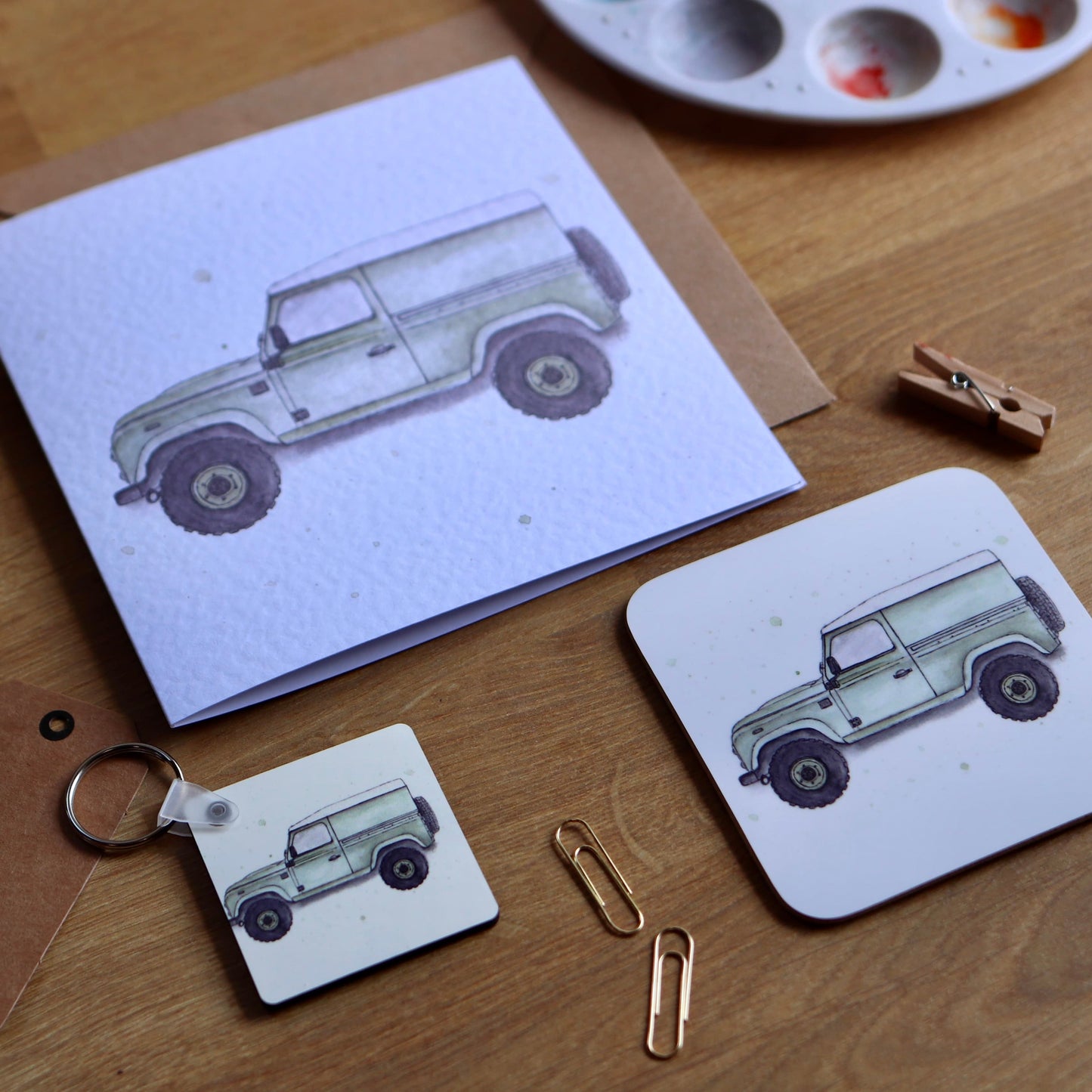 Greeting card, coaster and keyring with illustration of green defender.