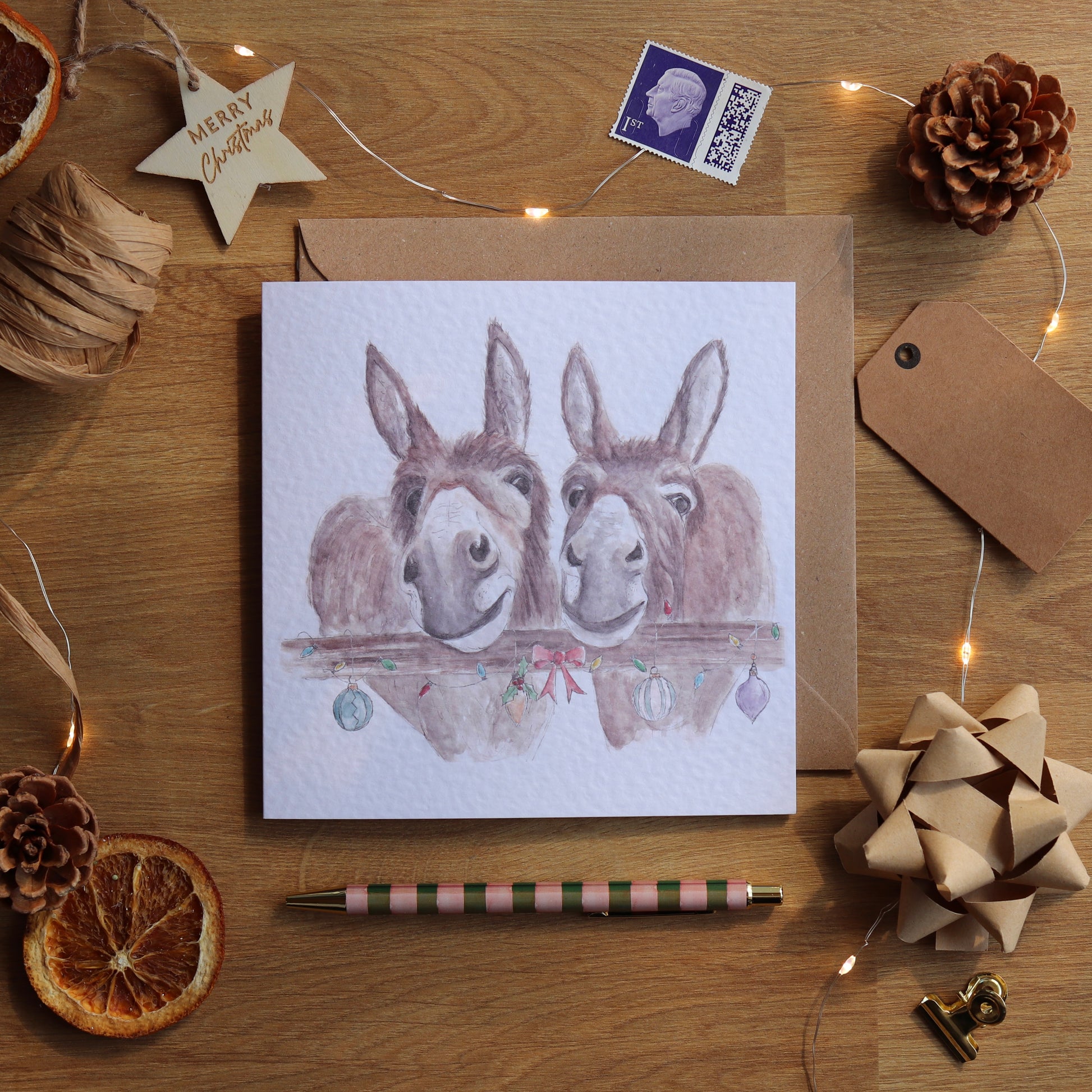 Christmas card of festive donkeys