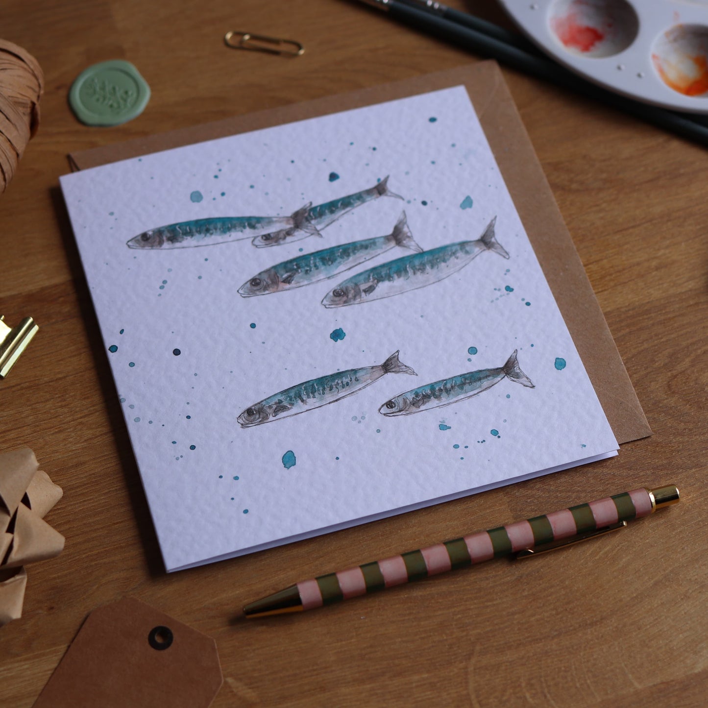 Greeting card with illustration of a shoal of mackerel