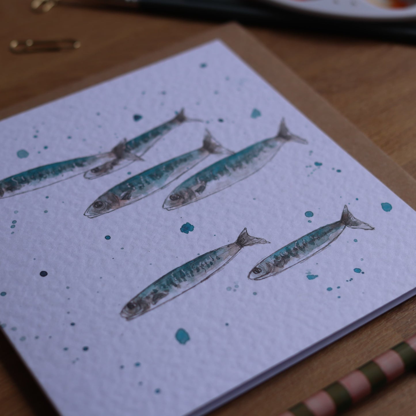 Greeting card with illustration of shoal of mackerel