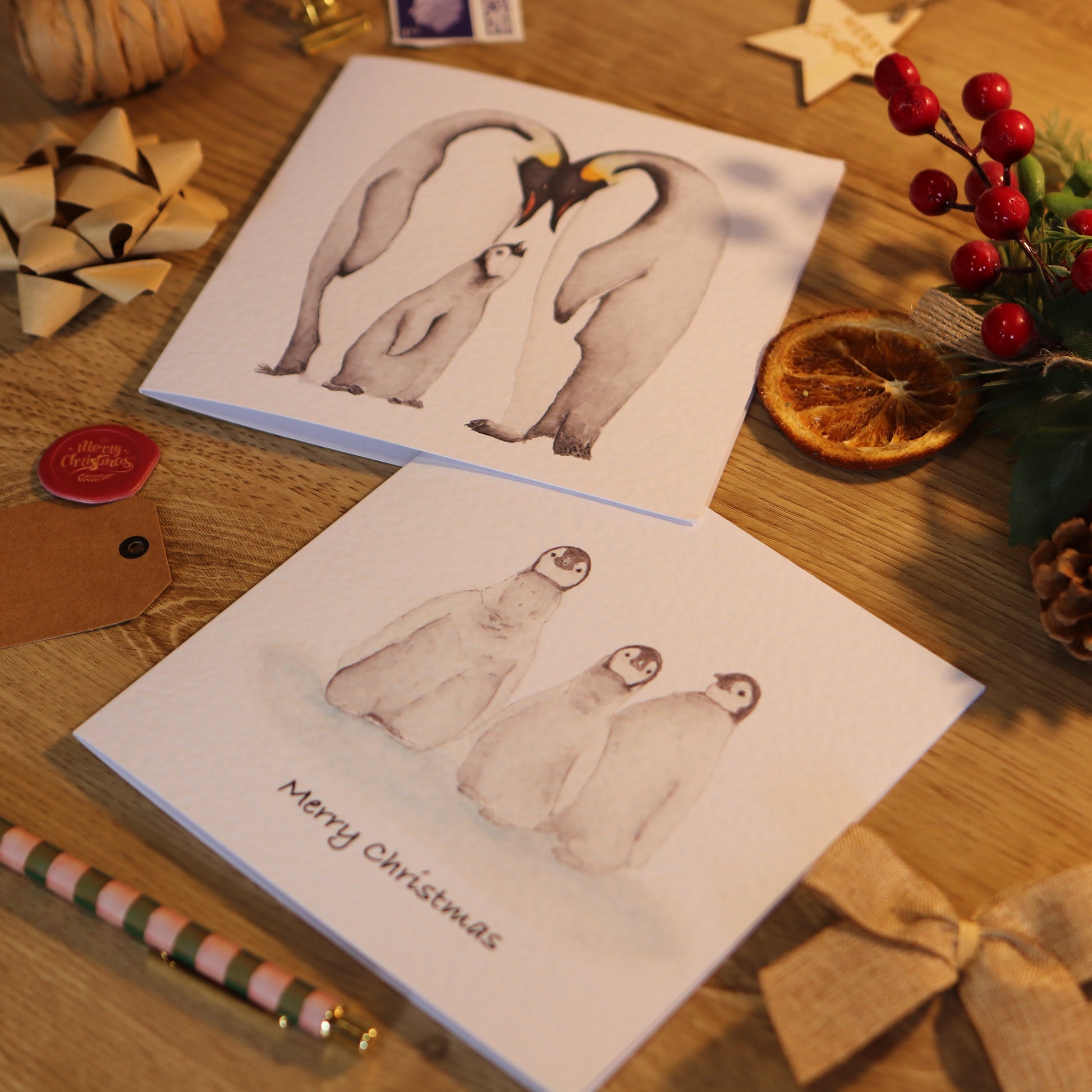 Christmas cards with illustrations of penguins