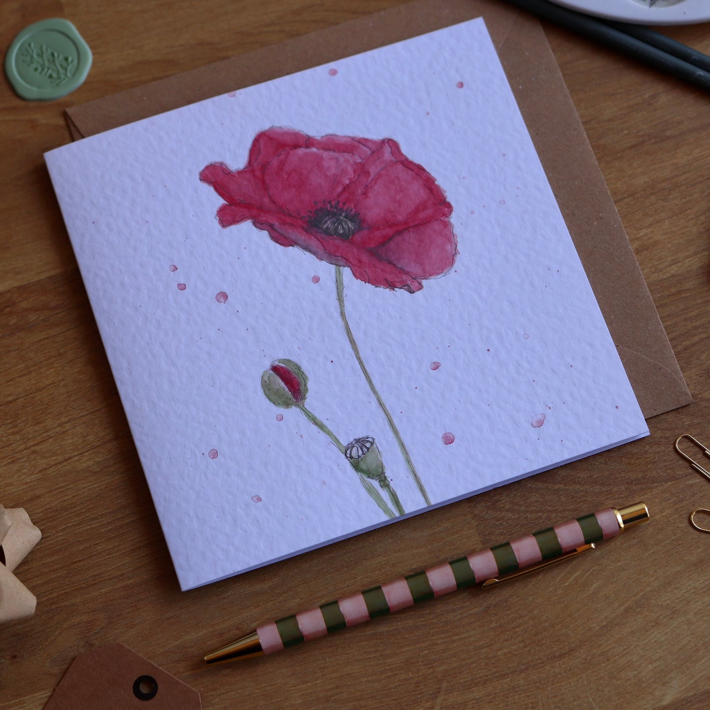 Greeting card with illustration of vibrant red poppy