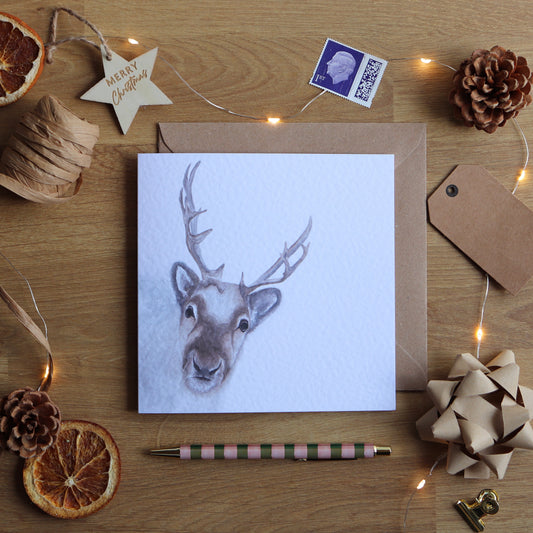 Christmas card with illustration of a reindeer